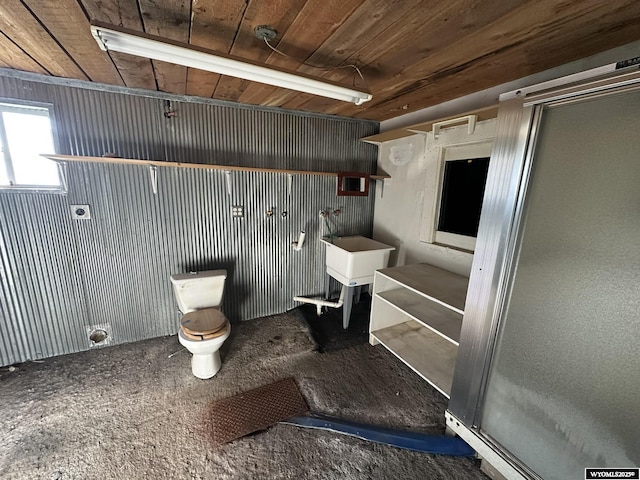 107 S Laramie Ave, Fort Laramie, WY 82212 - bathroom with wood ceiling and toilet