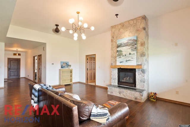 6 Chapparal, Douglas, WY 82633 - living room featuring wood finished floors, a chandelier, baseboards, and a fireplace