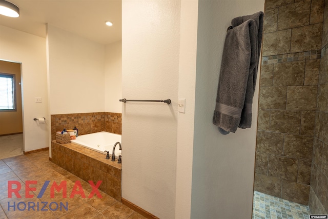 6 Chapparal, Douglas, WY 82633 - bathroom with a garden tub, tile patterned floors, a tile shower, baseboards, and recessed lighting