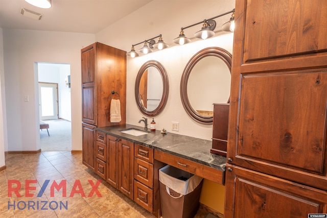 6 Chapparal, Douglas, WY 82633 - bathroom featuring vanity and tile patterned flooring