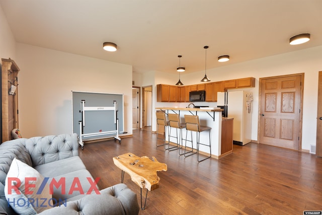 6 Chapparal, Douglas, WY 82633 - living area featuring dark wood finished floors