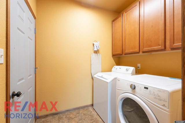 6 Chapparal, Douglas, WY 82633 - laundry area with cabinet space, independent washer and dryer, baseboards, and light stone finish floors