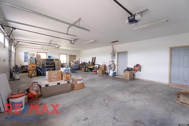 6 Chapparal, Douglas, WY 82633 - garage with a garage door opener and electric panel