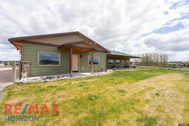 6 Chapparal, Douglas, WY 82633 - rear view of house featuring a patio area