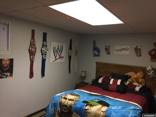 bedroom with a paneled ceiling