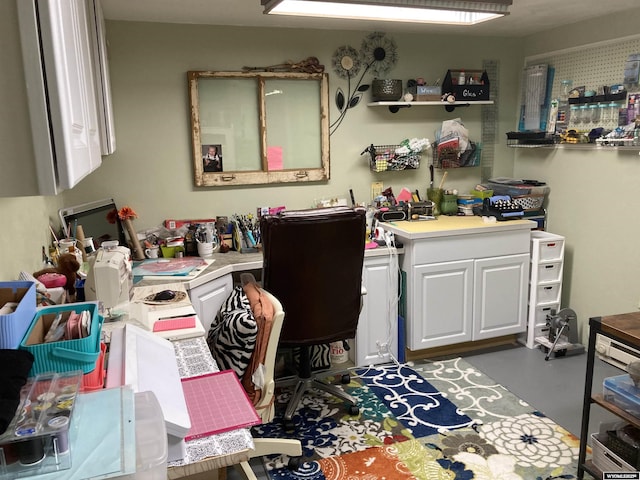 home office with finished concrete floors