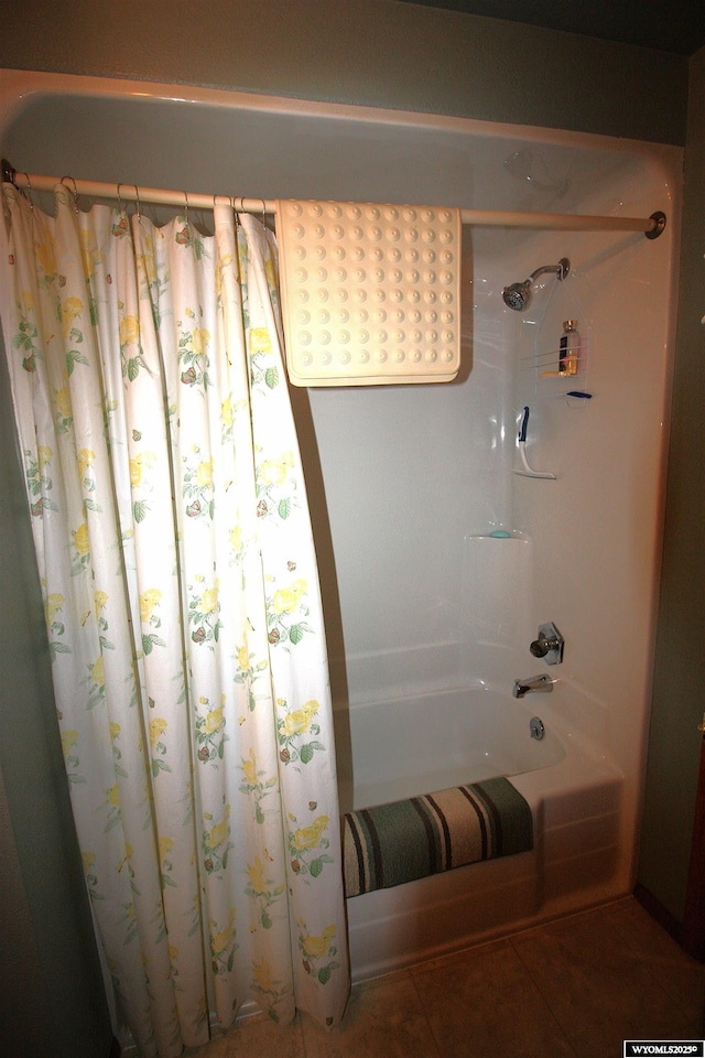 800 E 30th Ave, Torrington, WY 82240 - bathroom with shower / bathtub combination with curtain