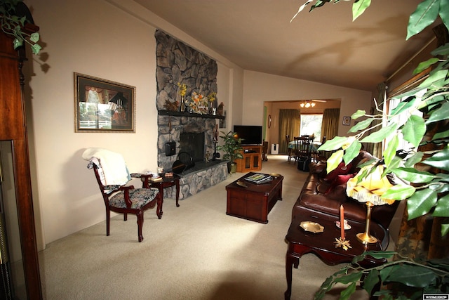 800 E 30th Ave, Torrington, WY 82240 - living room with carpet floors, a fireplace, and vaulted ceiling