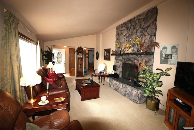 800 E 30th Ave, Torrington, WY 82240 - carpeted living room featuring lofted ceiling and a fireplace
