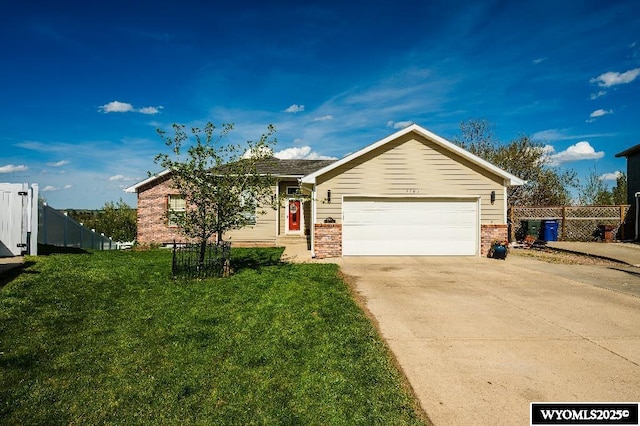 1705 N Heights Cir, Sheridan, WY 82801 - ranch-style house with concrete driveway, a garage, and brick siding