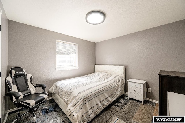 1705 N Heights Cir, Sheridan, WY 82801 - bedroom featuring baseboards and a textured wall