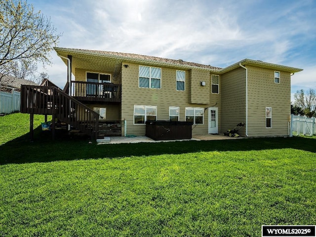 1705 N Heights Cir, Sheridan, WY 82801 - rear view of house with a hot tub, a deck, stairs, and a patio