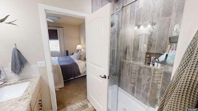 ensuite bathroom with a shower stall and vanity