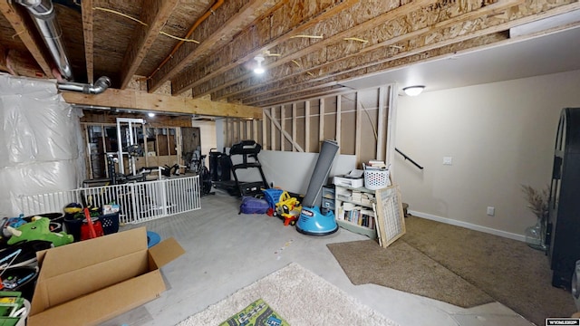 unfinished below grade area featuring baseboards