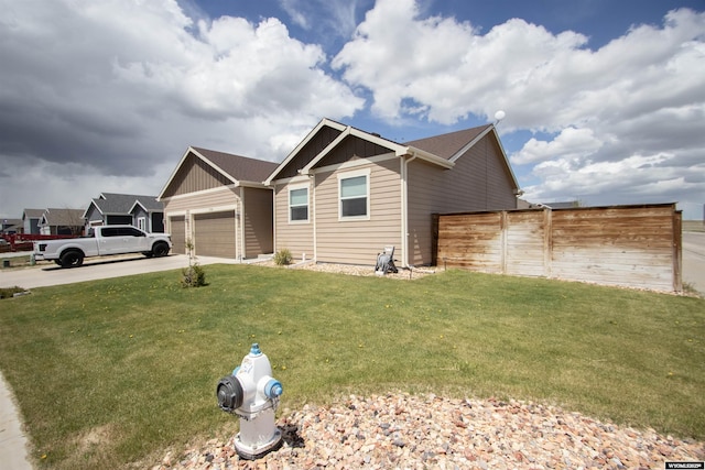 view of front of property with board and batten siding, an attached garage, and concrete driveway