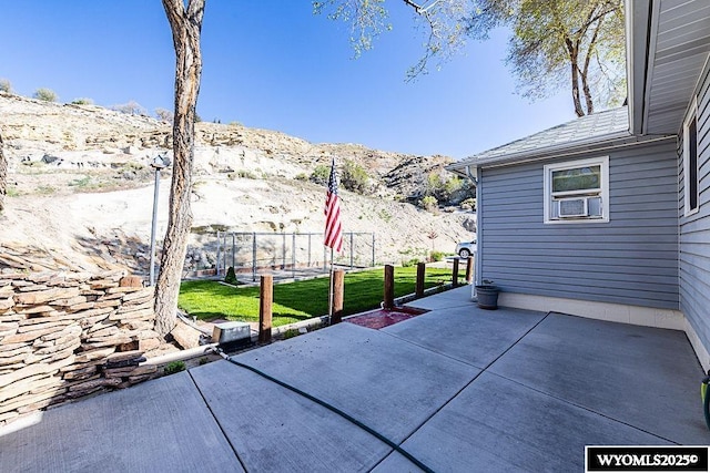 508 Sidney St, Rock Springs, WY 82901 - view of patio / terrace with a mountain view and cooling unit