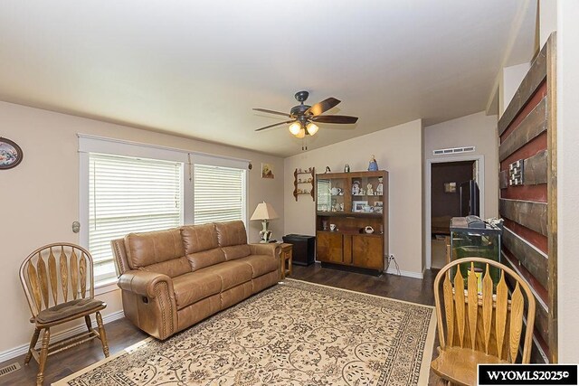 15 Greve Cir, Rock Springs, WY 82901 - living area featuring wood finished floors, a ceiling fan, and baseboards