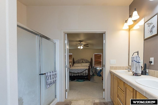 15 Greve Cir, Rock Springs, WY 82901 - ensuite bathroom with a shower stall, a ceiling fan, and double vanity
