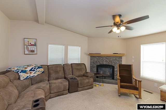 15 Greve Cir, Rock Springs, WY 82901 - living area with ceiling fan, carpet, and a stone fireplace