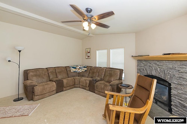 15 Greve Cir, Rock Springs, WY 82901 - carpeted living area featuring ceiling fan, a fireplace, and lofted ceiling