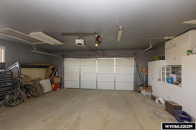 15 Greve Cir, Rock Springs, WY 82901 - garage featuring a garage door opener