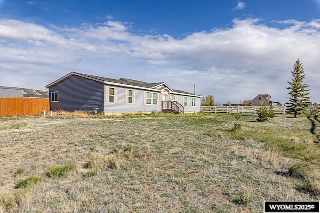 15 Greve Cir, Rock Springs, WY 82901 - view of side of property with fence