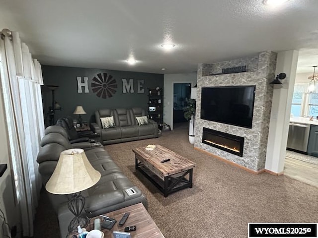 750 N Adams Ave, Buffalo, WY 82834 - living area featuring a stone fireplace and carpet