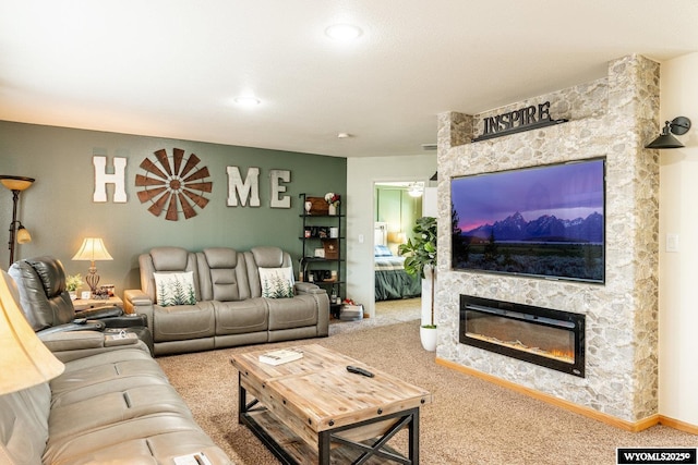 750 N Adams Ave, Buffalo, WY 82834 - carpeted living room featuring a stone fireplace