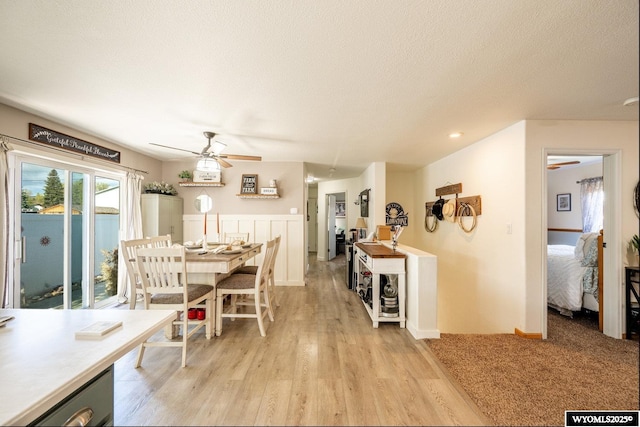 750 N Adams Ave, Buffalo, WY 82834 - dining room featuring a ceiling fan, light wood-type flooring, and a textured ceiling