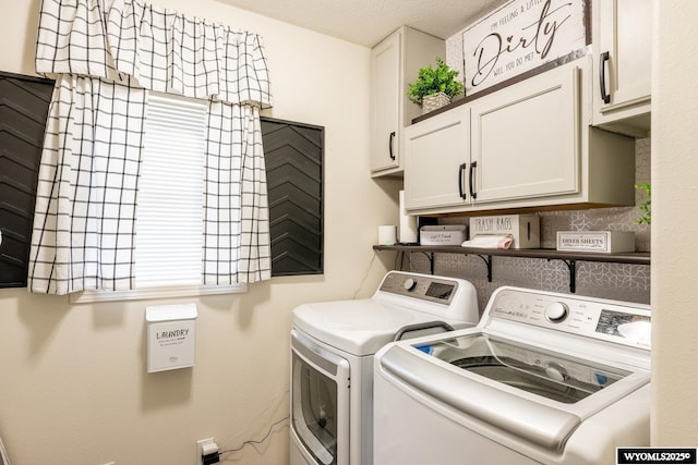 750 N Adams Ave, Buffalo, WY 82834 - washroom featuring washing machine and dryer, cabinet space, and plenty of natural light