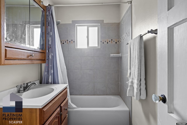 full bath featuring shower / bathtub combination with curtain and vanity