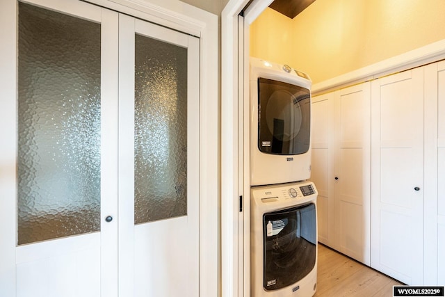1030 N Main St, Sheridan, WY 82801 - laundry room featuring estacked washer and dryer and light wood finished floors