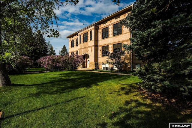 1030 N Main St, Sheridan, WY 82801 - back of house with a lawn