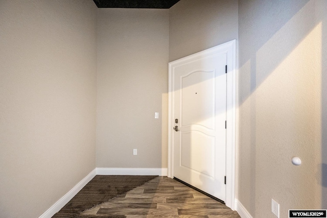 1030 N Main St, Sheridan, WY 82801 - entryway with baseboards and dark wood finished floors