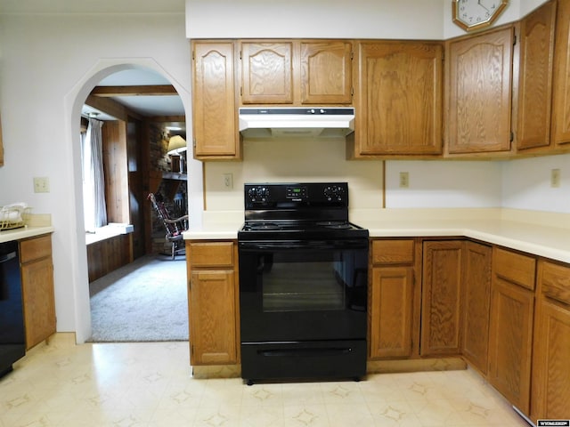 295 N 1st Street E, St, Green River, WY 82935 - kitchen featuring black appliances, under cabinet range hood, arched walkways, and light countertops