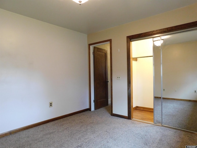 295 N 1st Street E, St, Green River, WY 82935 - unfurnished bedroom featuring carpet, a closet, and baseboards