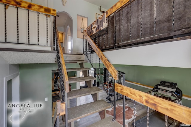 stairs featuring arched walkways