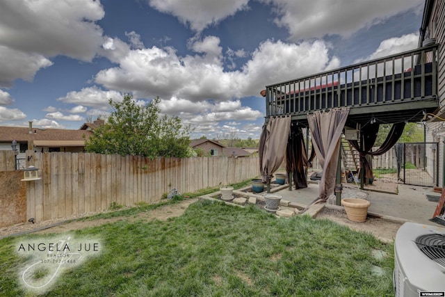 view of yard featuring cooling unit and stairs