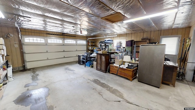 garage with wood walls