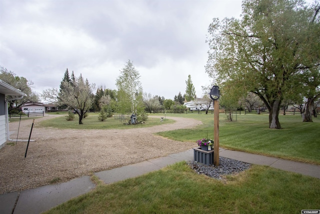 surrounding community featuring a lawn