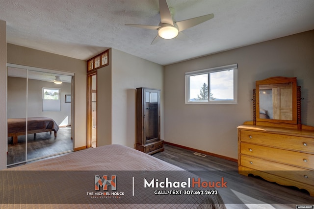 bedroom featuring wood finished floors, baseboards, a closet, and ceiling fan