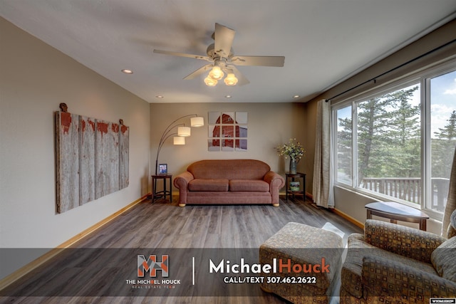 living area featuring baseboards, wood finished floors, ceiling fan, and recessed lighting