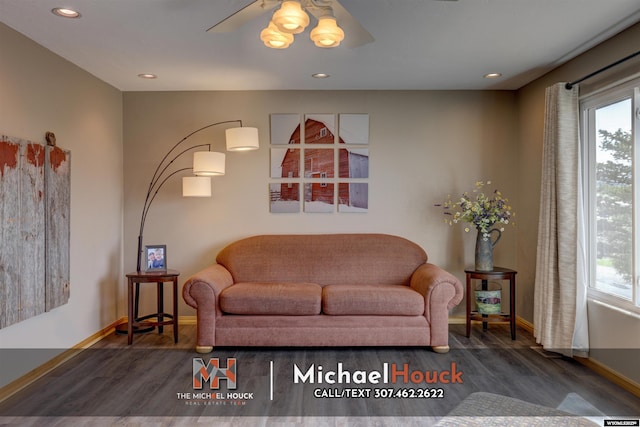 living room with baseboards, wood finished floors, a ceiling fan, and recessed lighting