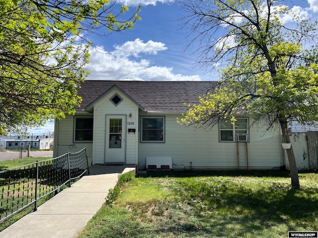 1208 10th St, Wheatland, WY 82201 - view of front of home with roof with shingles