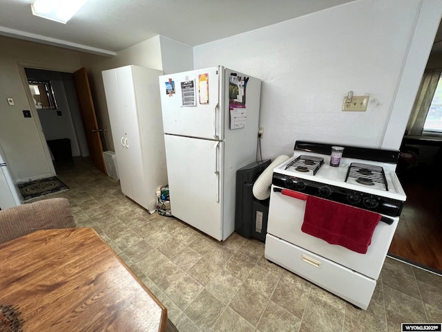 1208 10th St, Wheatland, WY 82201 - kitchen featuring white appliances