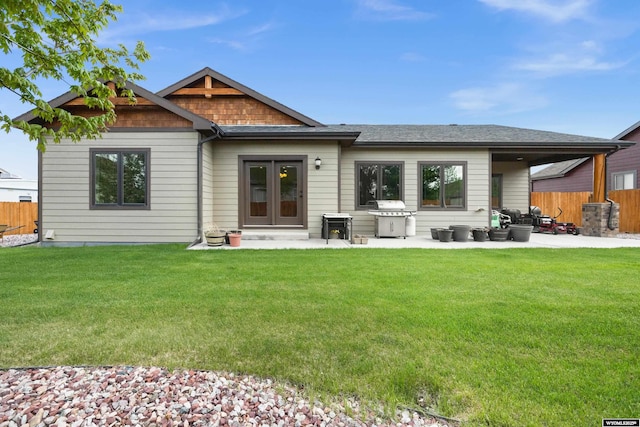 back of property featuring a patio area and french doors