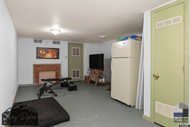 718 E 5th St, Casper, WY 82601 - exercise room with a fireplace