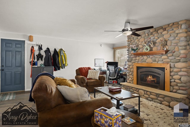718 E 5th St, Casper, WY 82601 - living room featuring a ceiling fan, wood finished floors, and a fireplace