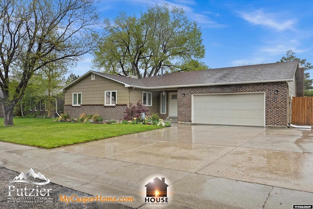 view of front of property featuring an attached garage, driveway, brick siding, and roof with shingles