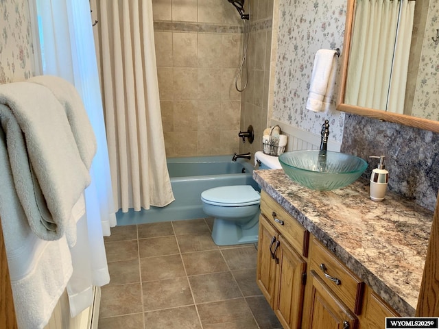 19A Kolman Ranch Rd, Rock Springs, WY 82901 - full bathroom with wallpapered walls, shower / bathtub combination with curtain, vanity, toilet, and tile patterned floors